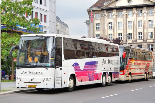 BERLIN, GERMANY - SEPTEMBER 12, 2013: White Volvo 9900 interurban coach at the city street.