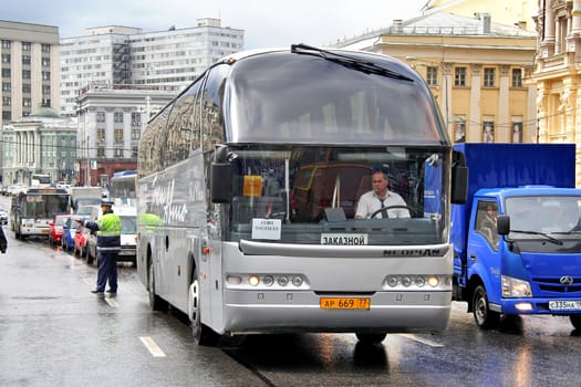 MOSCOW, RUSSIA - JUNE 3, 2012: Grey Neoplan N516SHD Starliner interurban coach at the city street.