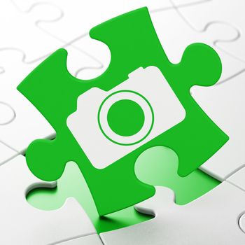 Travel concept: Photo Camera on Green puzzle pieces background, 3d render