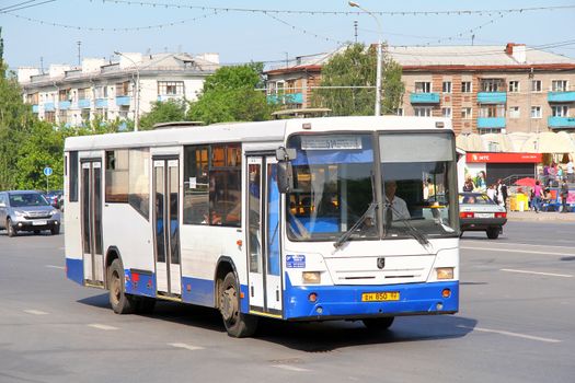 UFA, RUSSIA - MAY 25, 2012: White and blue NEFAZ 5299 city bus of the Bashavtotrans bus company at city street.