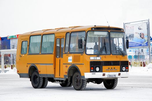 PANGODY, RUSSIA - FEBRUARY 4, 2013: Yellow PAZ 3206 off-road bus at the city street.