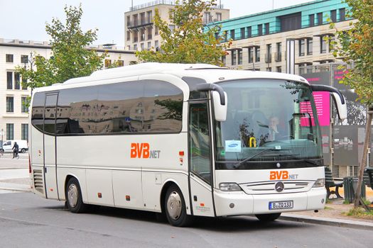 BERLIN, GERMANY - SEPTEMBER 10, 2013: White Mercedes-Benz O510 Tourino coach of Bus-Verkehr-Berlin KG bus company at the city street.