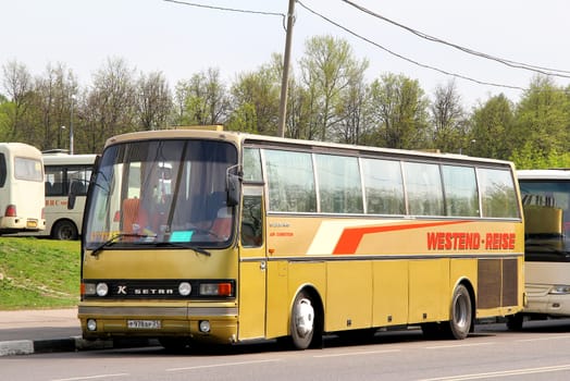 MOSCOW, RUSSIA - MAY 5, 2012: Golden Setra S215HD interurban coach at the city street.