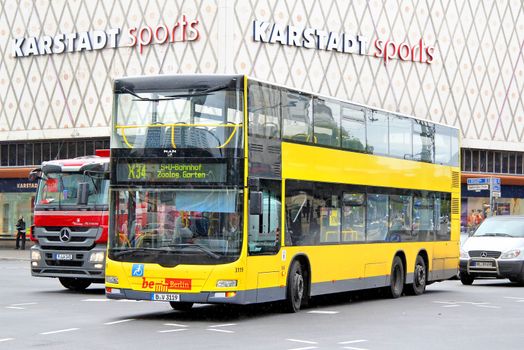 BERLIN, GERMANY - SEPTEMBER 10, 2013: Yellow MAN A39 Lion's City DD double-decker bus of Berliner Verkehrsbetriebe bus company at the city street.
