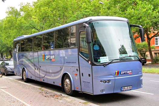 BERLIN, GERMANY - SEPTEMBER 10, 2013: Purple VDL Bova Futura interurban coach at the city street.