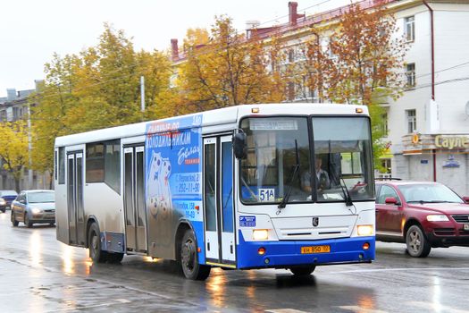UFA, RUSSIA - OCTOBER 3, 2011: White and blue NEFAZ 5299 city bus at the city street.
