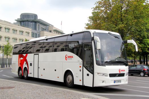 BERLIN, GERMANY - SEPTEMBER 12, 2013: White Carrus 9700HD interurban coach at the city street.