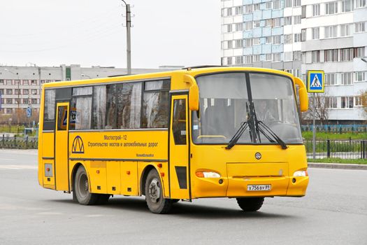 NOVYY URENGOY, RUSSIA - SEPTEMBER 22, 2012: Yellow PAZ 4230 Avrora interurban coach at the city street.