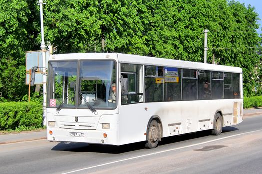 VELIKIY NOVGOROD, RUSSIA - MAY 23, 2013: White NEFAZ 5299 city bus at the city street.