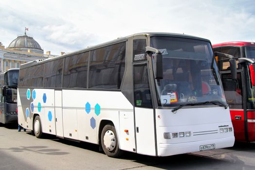 SAINT PETERSBURG, RUSSIA - MAY 25, 2013: White Droegmoeller E330H EuroComet interurban coach at the city street.