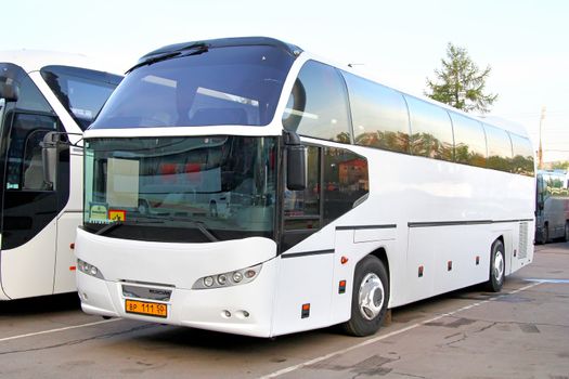 MOSCOW, RUSSIA - MAY 6, 2012: White Neoplan N116 Cityliner interurban coach at the city street.