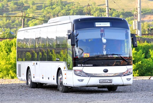 ASHA, RUSSIA - JUNE 2, 2014: White Yutong ZK6121HQ suburban bus at the city street.