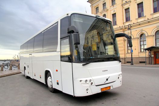 SAINT PETERSBURG, RUSSIA - MAY 26, 2013: White Volvo 9900 interurban coach at the city street.