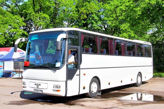 SAINT PETERSBURG, RUSSIA - MAY 27, 2013: White MAN A03 Lion's Star interurban coach at the bus station.