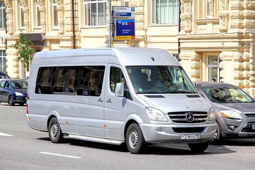 MOSCOW, RUSSIA - JUNE 2, 2013: Silver Mercedes-Benz W906 Sprinter touristic minibus at the city street..