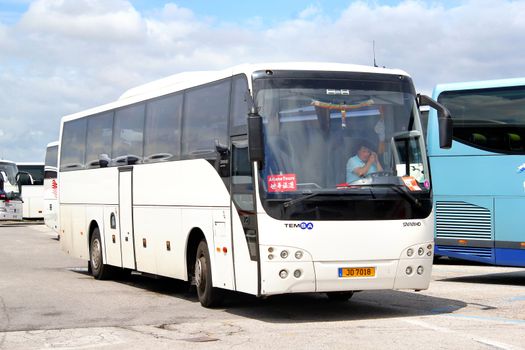 VENICE, ITALY - JULY 30, 2014: White interurban coach Temsa Safari HD at the touristic bus station.