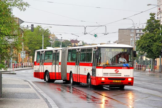 PRAGUE, CZECH REPUBLIC - JULY 21, 2014: Articulated city bus Karosa B941E at the city street.