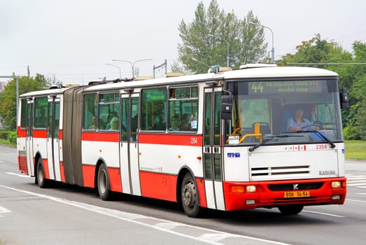 BRNO, CZECH REPUBLIC - JULY 22, 2014: Articulated city bus Karosa B941E at the city street.