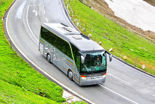 TYROL, AUSTRIA - JULY 29, 2014: German coach Setra S411HD at the Grossglockner High Alpine Road.