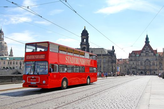 DRESDEN, GERMANY - JULY 20, 2014: Classic city sightseeing bus MAN SD200 at the city street.