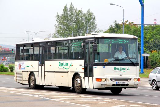 BRNO, CZECH REPUBLIC - JULY 22, 2014: Interurban coach Karosa C954E at the city street.