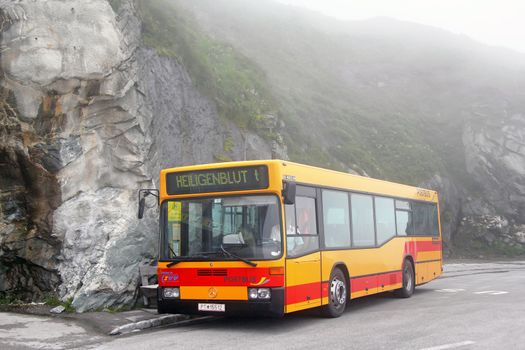 TYROL, AUSTRIA - JULY 29, 2014: City bus Mercedes-Benz O405N2K at the Grossglockner high mountain Alpine road.