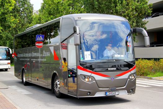 VENICE, ITALY - JULY 30, 2014: Touristic coach Scania OmniExpress 360 at the city street.