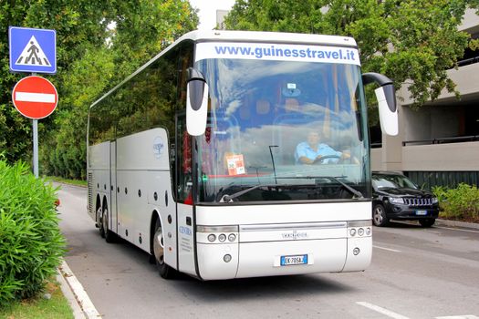 VENICE, ITALY - JULY 30, 2014: Touristic coach Van Hool T916 Astron at the city street.