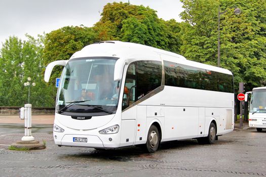 PARIS, FRANCE - AUGUST 8, 2014: Touristic coach Irizar i6 at the city street.