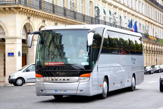 PARIS, FRANCE - AUGUST 8, 2014: Touristic coach Setra S415HD at the city street.