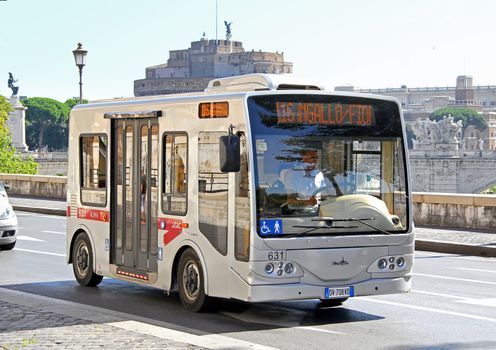 ROME, ITALY - AUGUST 1, 2014: Small city bus Tecnobus Gulliver at the city street.