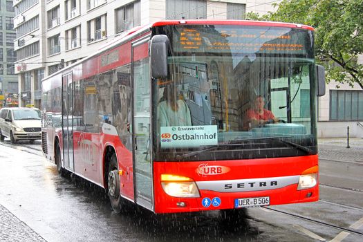 BERLIN, GERMANY - AUGUST 16, 2014: Modern suburban bus Setra S415NF at the city street.