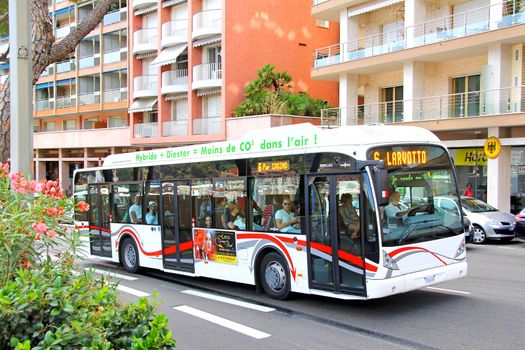 MONTE CARLO, MONACO - AUGUST 2, 2014: Modern city bus Van Hool A330 at the city street.