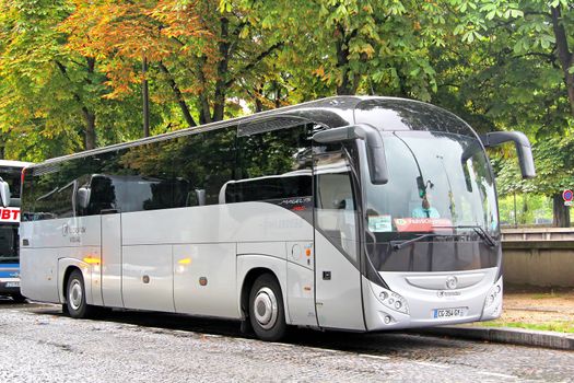 PARIS, FRANCE - AUGUST 8, 2014: Touristic coach Irisbus Magelys Pro at the city street.