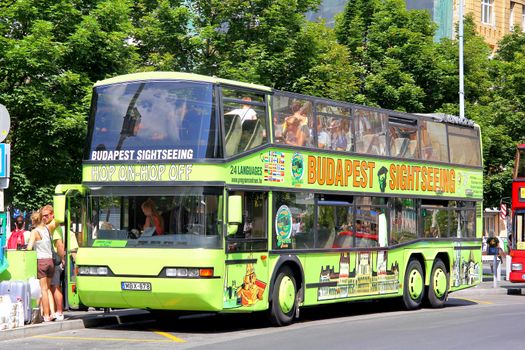 BUDAPEST, HUNGARY - JULY 25, 2014: City sightseeing bus Neoplan N4026/3 at the city street.