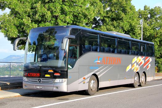 SWITZERLAND - AUGUST 5, 2014: Touristic coach Mercedes-Benz O350-16RHD Tourismo at the interurban freeway.