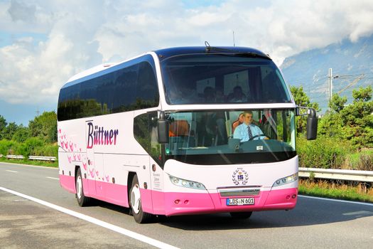 SWITZERLAND - AUGUST 5, 2014: Touristic coach Neoplan N1216HD Cityliner at the interurban freeway.