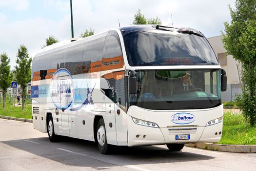 VENICE, ITALY - JULY 30, 2014: Touristic coach Neoplan N1216HD Cityliner at the city street.