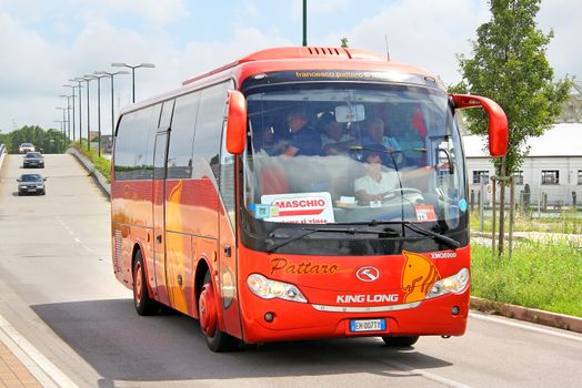 VENICE, ITALY - JULY 30, 2014: Chinese touristic coach KingLong XMQ6900 at the city street.