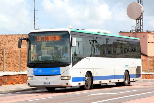 VENICE, ITALY - JULY 30, 2014: White suburban bus Irisbus Arway at the city street.