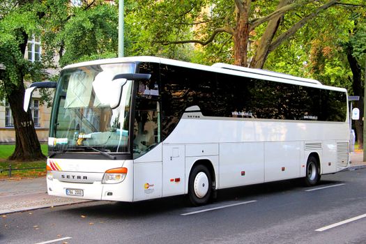 BERLIN, GERMANY - AUGUST 16, 2014: White Setra S415GT-HD interurban coach at the city street.