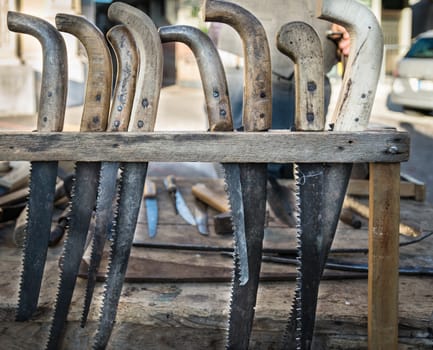 Hacksaws handmade using the worn blades of scythes.