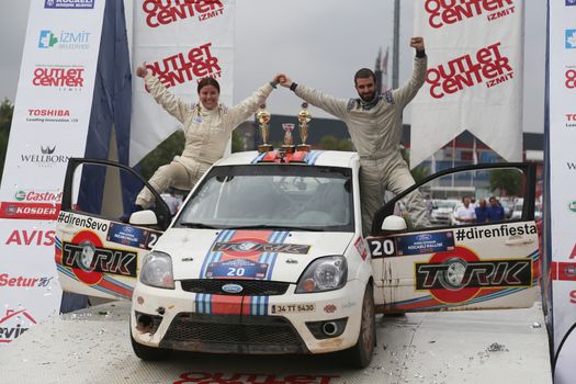 KOCAELI, TURKEY - AUGUST 23, 2015: Kerim Tar with Ford Fiesta ST in  Podium Ceremony of Kocaeli Rally 2015