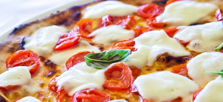 This is a true Italian Pizza. Traditional Pizza Margherita served in a Capri's restaurant, Naples Gulf, Italy.