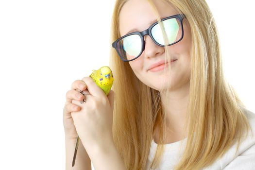 A girl with glasses and a parrot