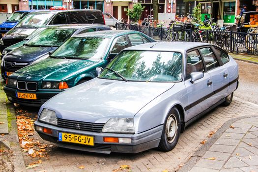 AMSTERDAM, NETHERLANDS - AUGUST 10, 2014: French retro car Citroen CX at the city street.