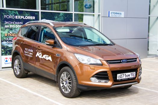 UFA, RUSSIA - AUGUST 31, 2013: Brand new crossover Ford Kuga at the trade center.