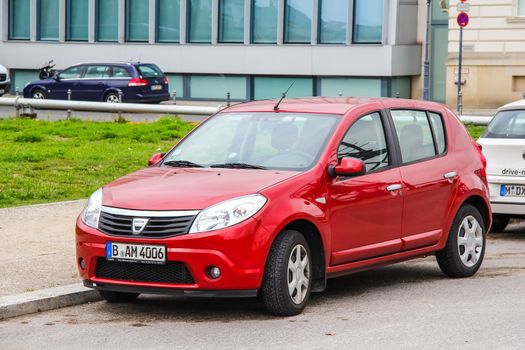 BERLIN, GERMANY - SEPTEMBER 12, 2013: Motor car Dacia Sandero at the city street.