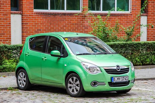 BERLIN, GERMANY - SEPTEMBER 12, 2013: Motor car Opel Agila at the city street.