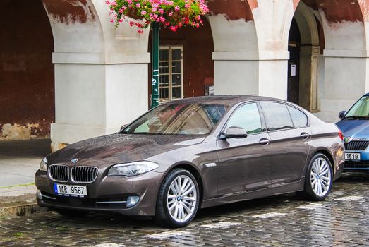 PRAGUE, CZECH REPUBLIC - JULY 21, 2014: Motor car BMW F10 5-series at the city street.